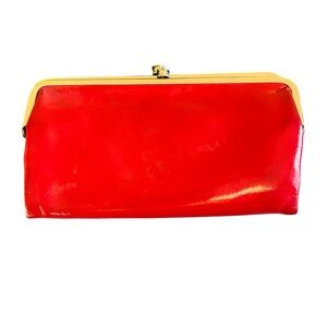 Hobo Lauren Clutch Wallet in a red glossy patent leather finish